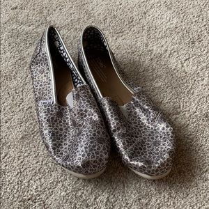 Women’s shiny silver TOMS